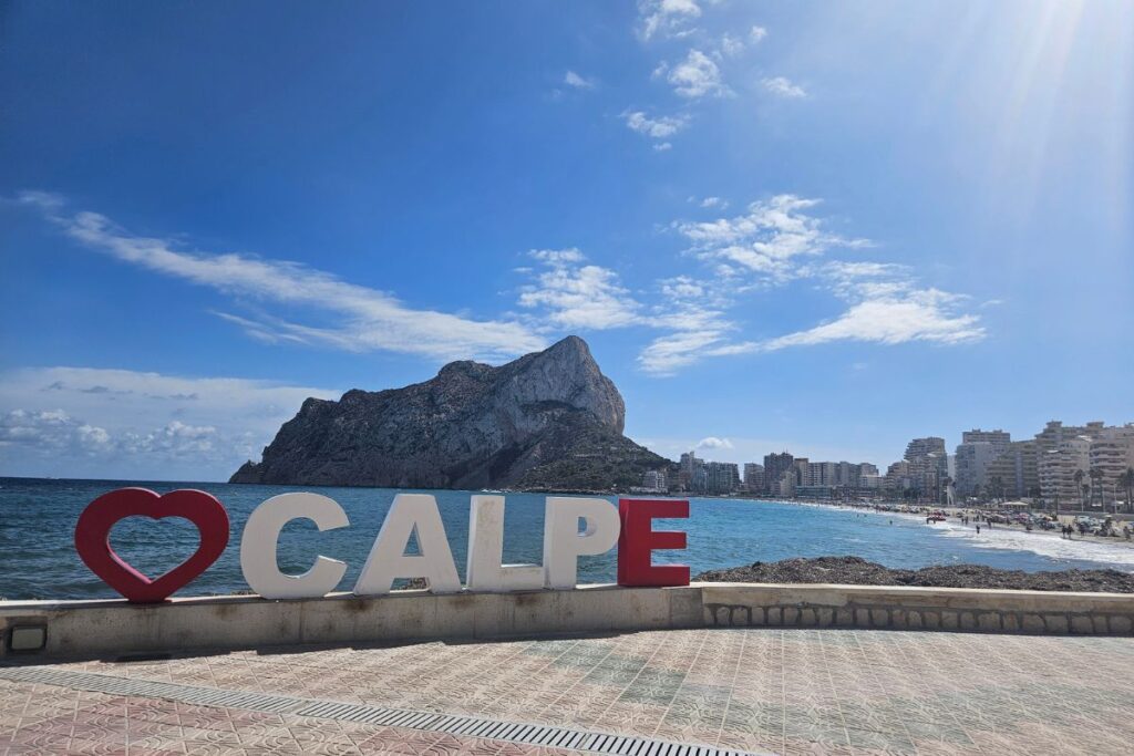calpe beach and sign