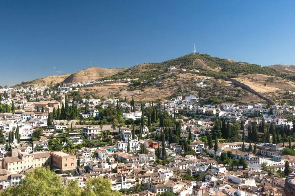 view over Granada city with mountains in the background