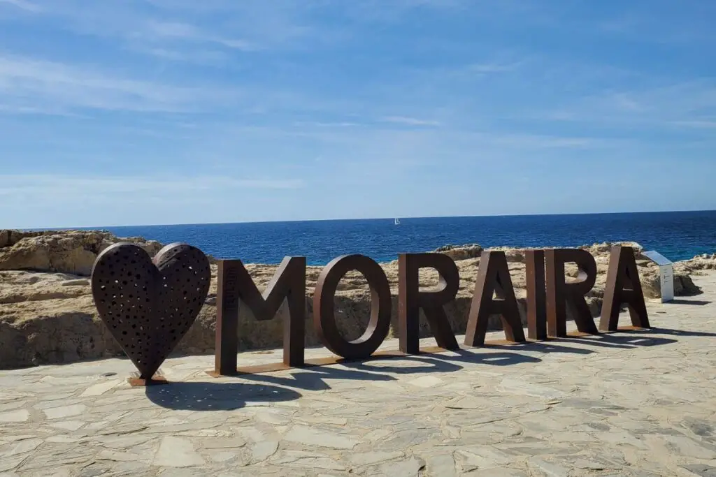 moraira sea view and sign A view out to sea with a sign spelling our Moraira in front