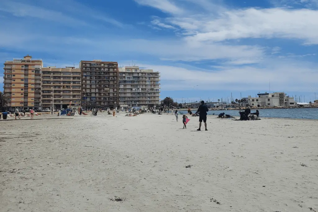 santa pola beach levante Playa de Levante sandy beach with blocks of flats in the background