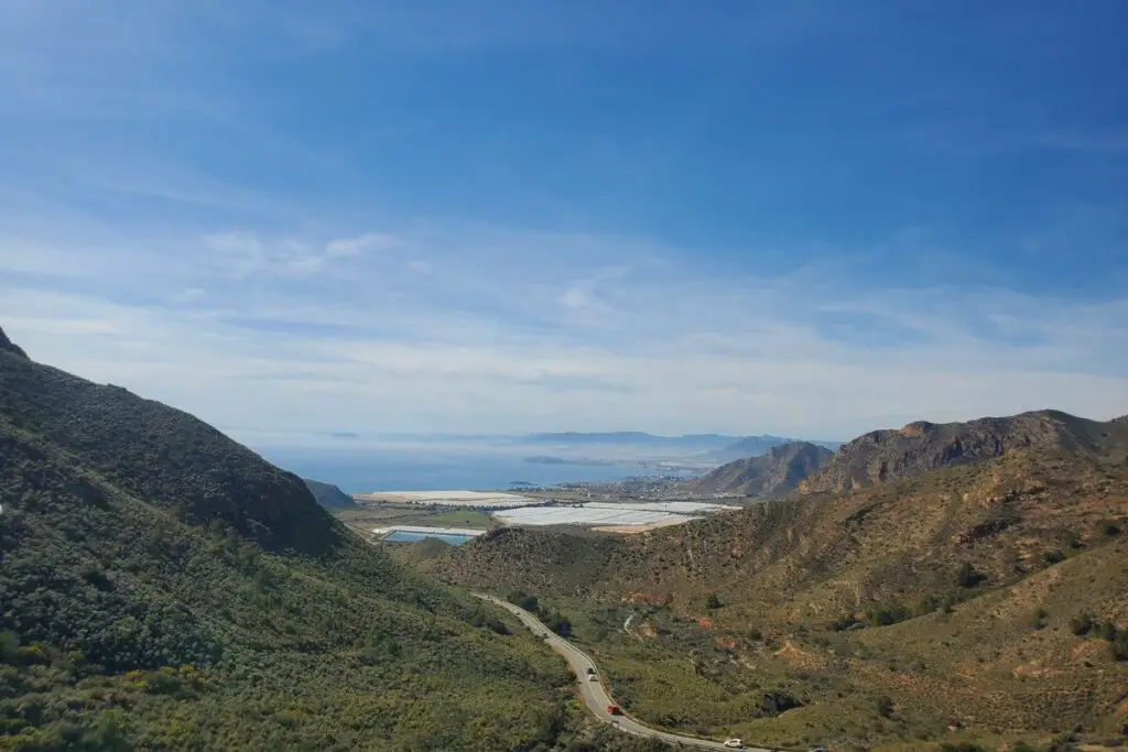 Looking down on the road to Cabo Tiñoso and the sea view surrounded by mountains